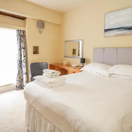 Сasa de vacaciones The Coach House *